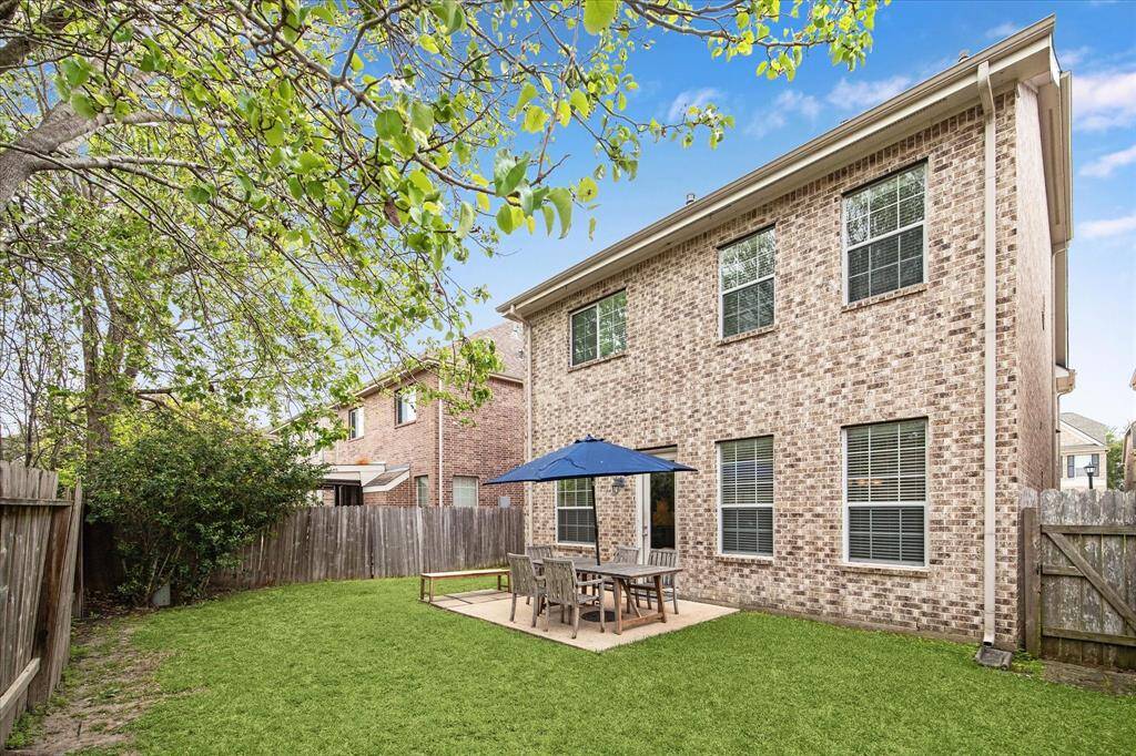 Pristine grounds peppered with lush landscaping add a density of color to this yard which the possibilities of customize it to your own private backyard oasis are plenty.