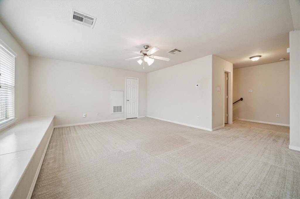 The fabulous game room serves as the perfect gathering space for family and friends, ideal for cozy movie nights, game days, or casual lounging. With its spacious layout and comfortable ambiance, it's designed to be the ultimate common room for entertainment and relaxation.