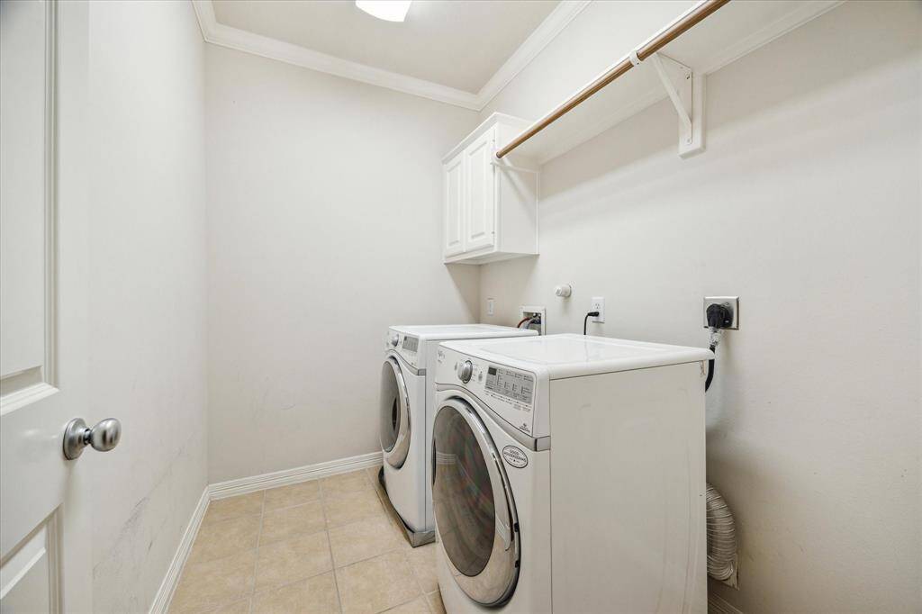 Laundry Room offers an expansive layout and plenty of storage space.