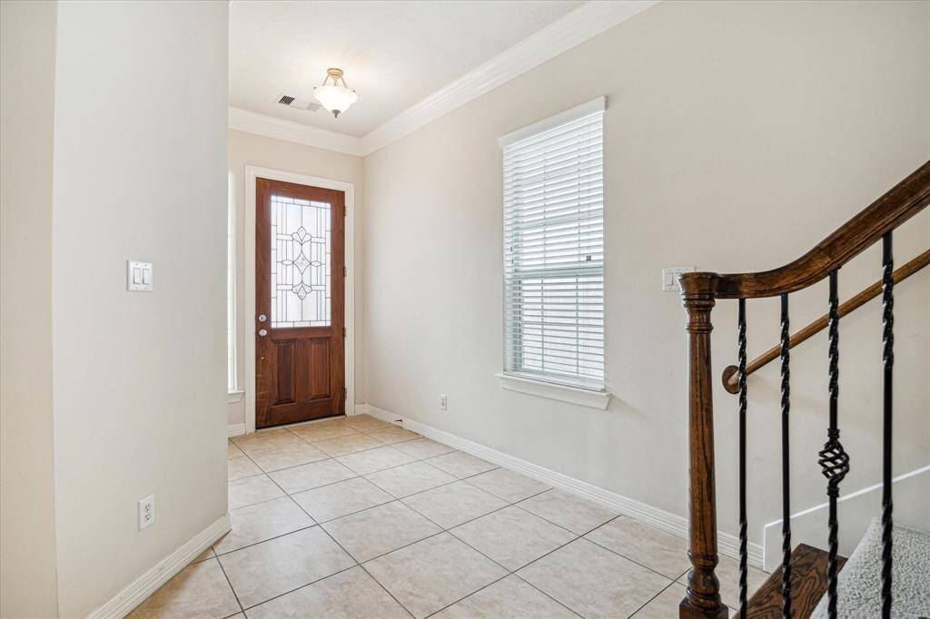 Step into a warm and inviting foyer adorned with gleaming neutral palette, high ceilings, and ample natural light extend a gracious welcome setting tone for the rest of the home.