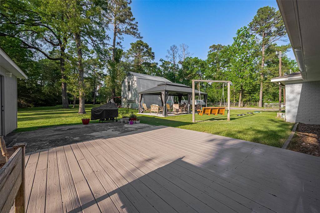 Step onto the sun deck off the sunroom, ideal for entertaining or enjoying a tranquil coffee break.