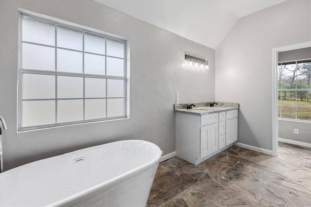 View of the First floor Primary Suite Bathroom from the shower.
