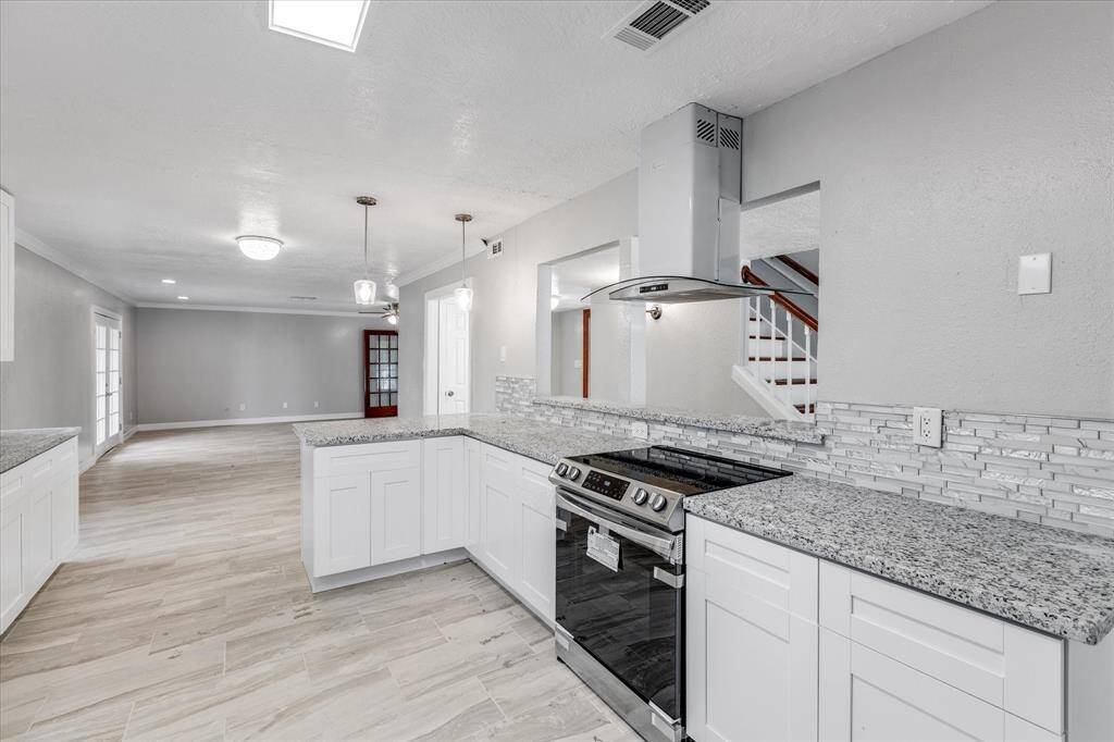 Capturing where the kitchen connects perfectly with the dining area.