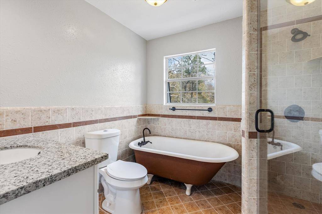 Beautiful full bath between secondary bedrooms.