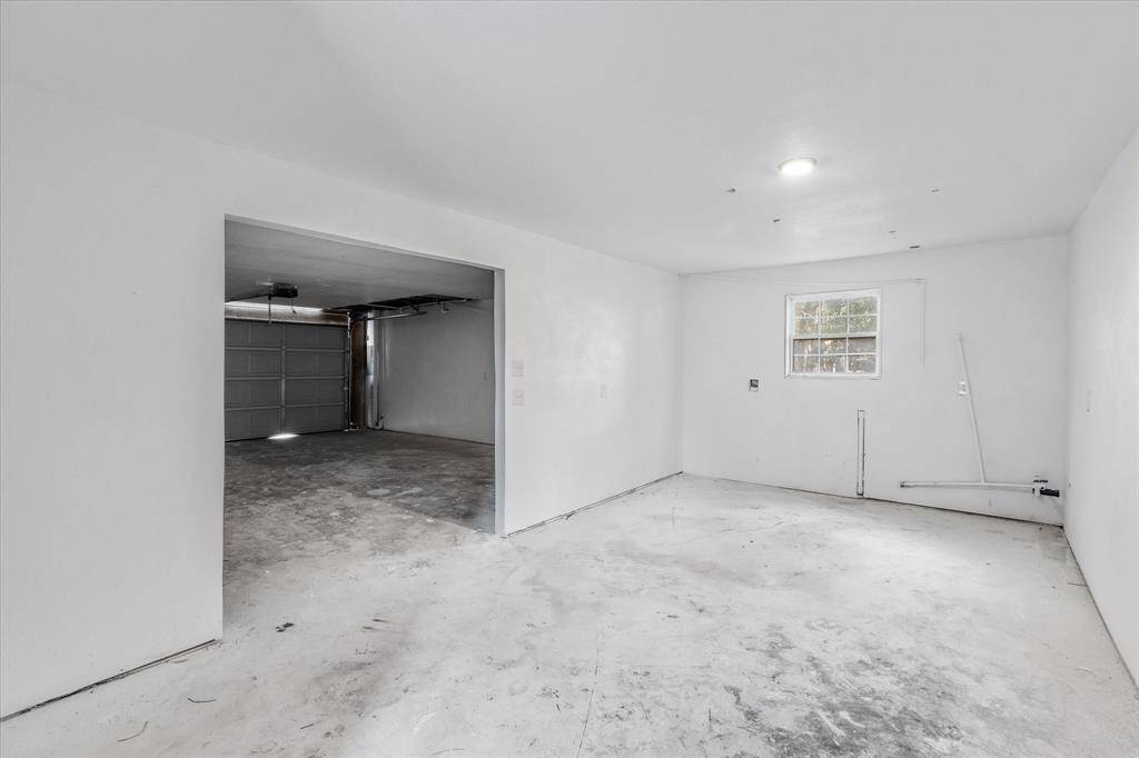 Expansive 2-Car Garage that seamlessly combines functionality with ample storage solutions.