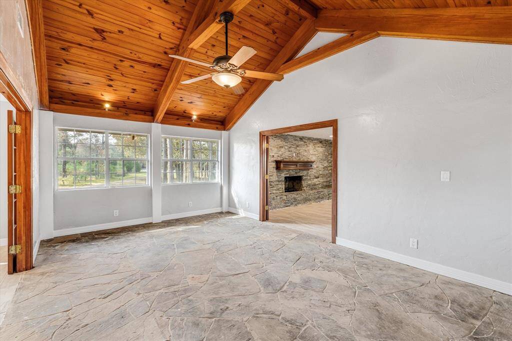 Comfortable yet stylish living environment, from one room to the next. This room seemlessly connects the first floor primary suite to the rest of the house.