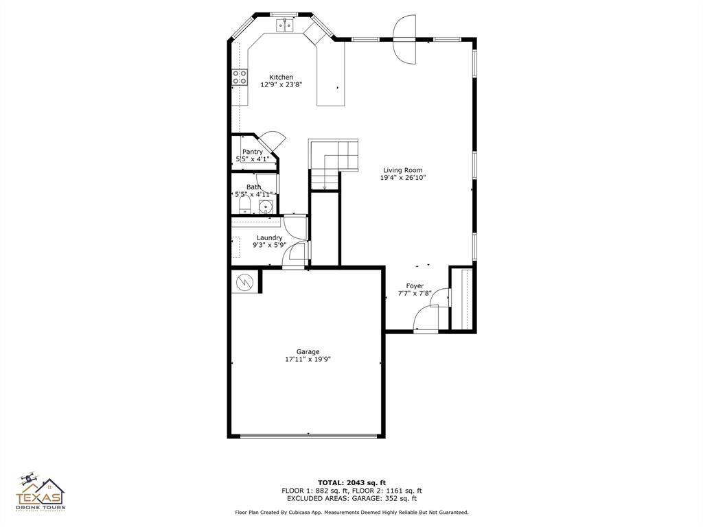 This floor plan features a master bedroom with an attached bath and walk-in closet, two additional bedrooms, an extra bathroom, and a spacious family room spread over two floors.
