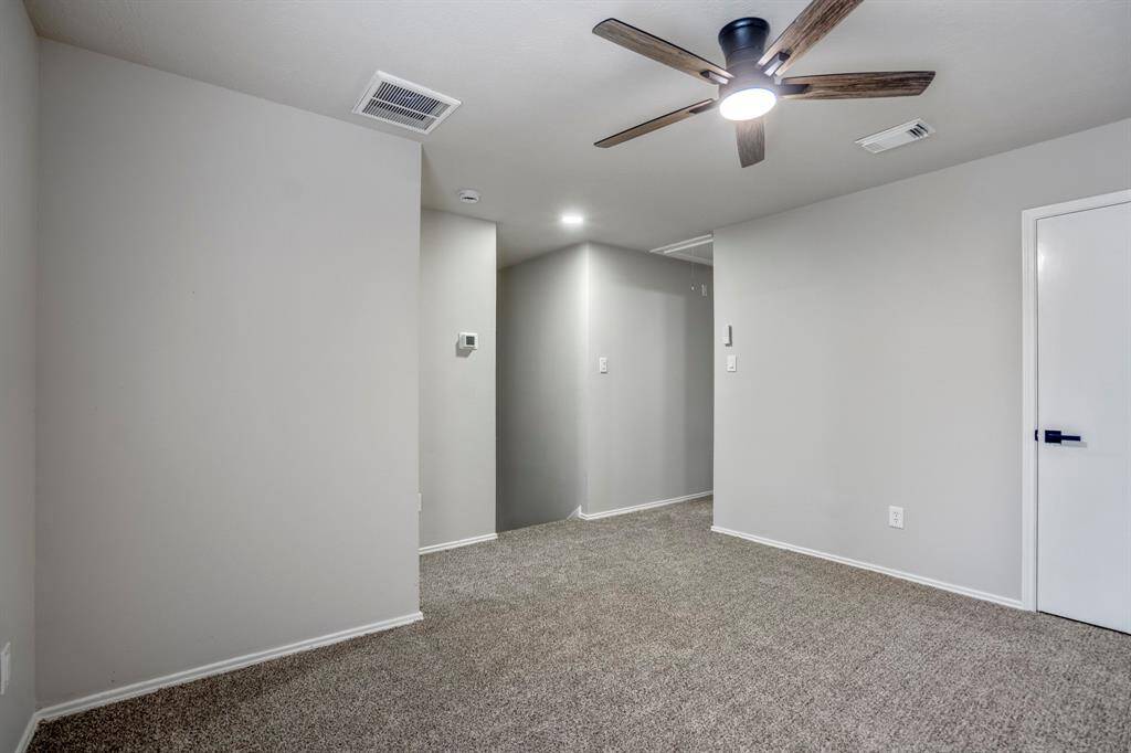 Centrally located at the top of the stairs, the game room offers a versatile space for entertaining, relaxing, or creating a dedicated play or media zone.
