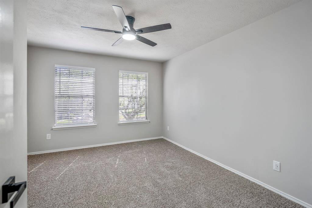Bedroom number 1 has new carpet, fresh paint and new ceiling fan.