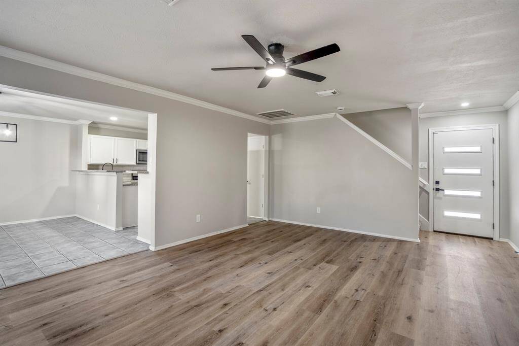 Step inside to a beautifully remodeled interior featuring fresh paint and brand-new flooring throughout — a clean, modern canvas ready for your personal touch!