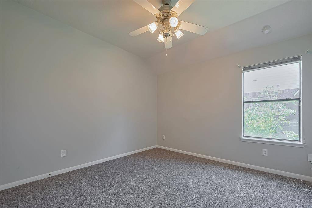 Bedroom # 3 with new paint, carpet and large closet.