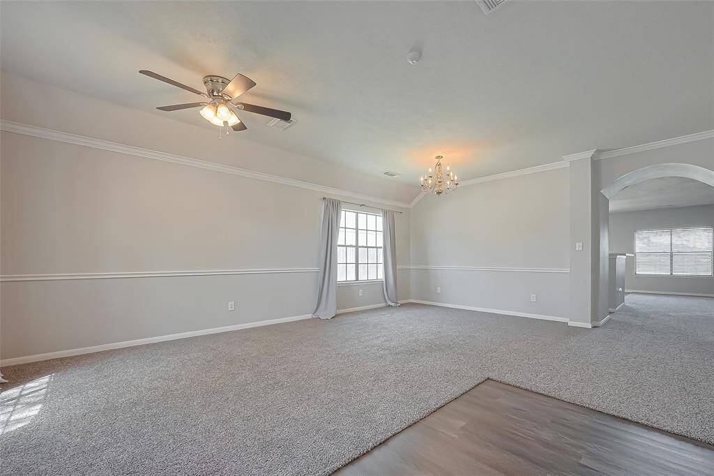 Formal dining and living are also located at the front of the home...this space is massive and multifunctional.