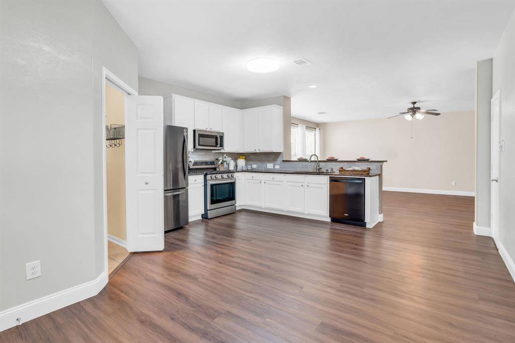 A look back at the Kitchen from the Dining Area & Living Area! 16727 Tranquility Park Dr., Cypress, TX  77429