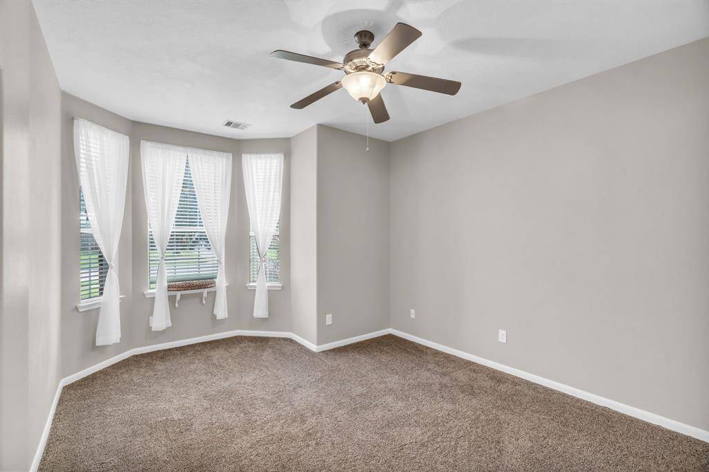 Secondary Bedroom with Bay Windows & Ceiling Fan! 16727 Tranquility Park Dr., Cypress, TX  77429