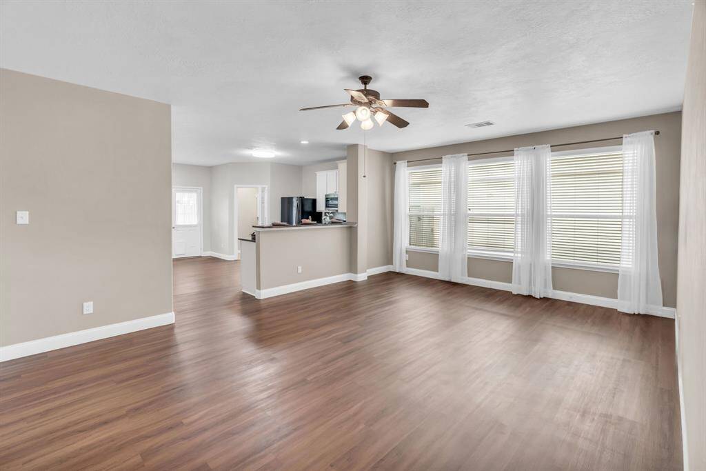 This Family Room provides lots of space for your entertaining needs! 16727 Tranquility Park Dr., Cypress, TX 77429