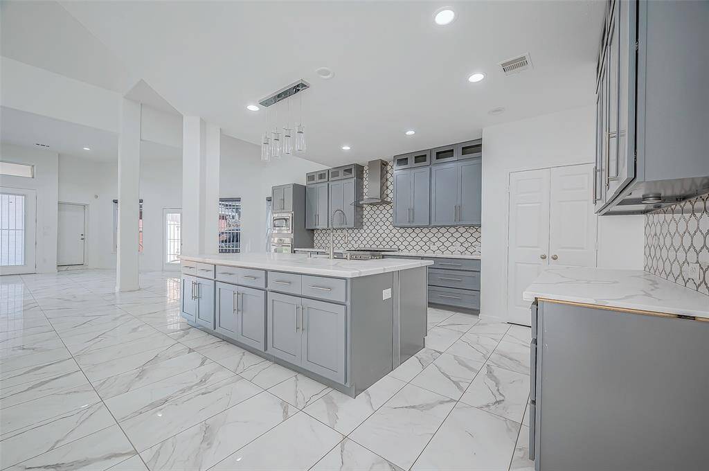 Remodeled Gourmet Island Kitchen! Extended family room- Plenty of space to entertain and create memories to cherish forever!