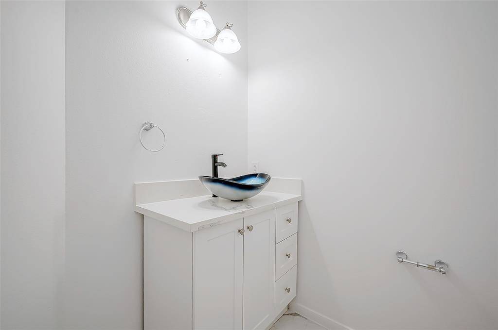 Spacious downstairs half bath.