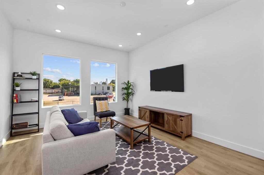 Expansive living room on second floor open to kitchen and dining room