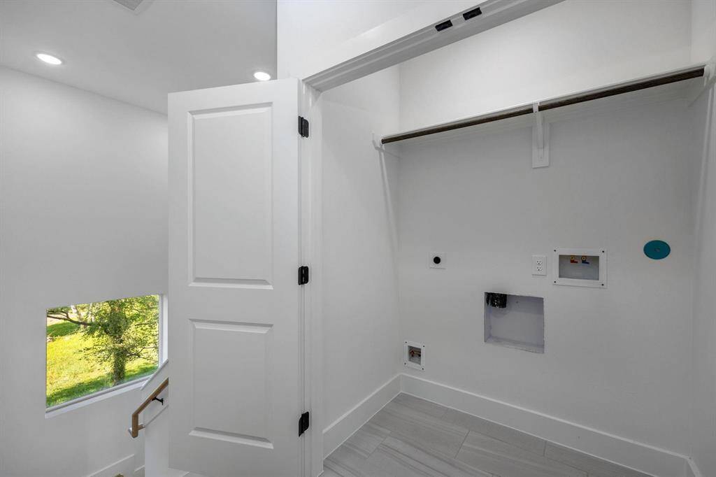 Utility room off of primary suite