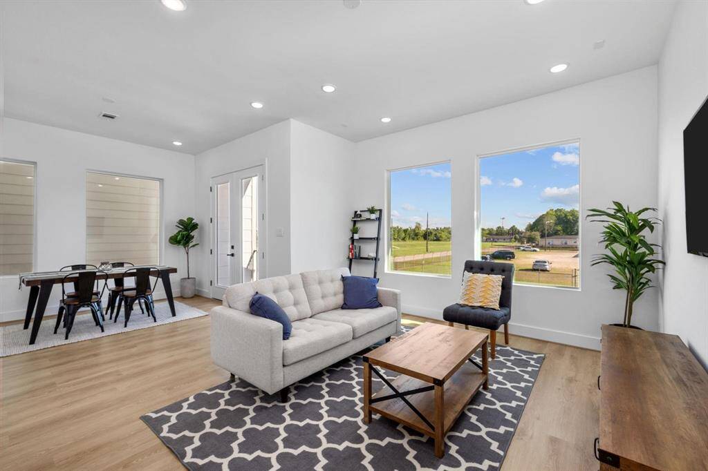 Expansive living room on second floor open to kitchen and dining room