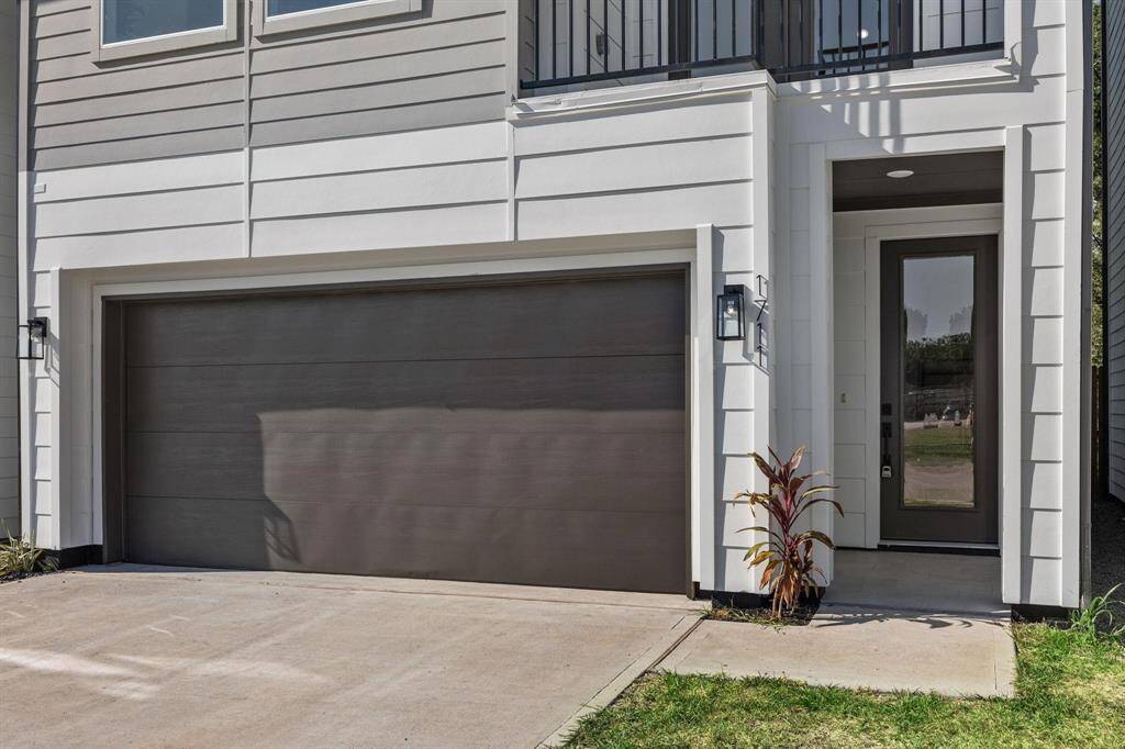 Contemporary, single-family detached home in highly sought-after Hardy Yard area with private driveway and 2 car attached garage.