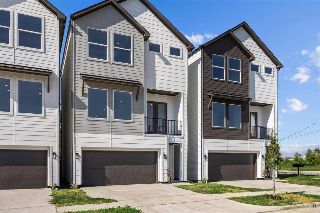 Contemporary, single-family detached home in highly sought-after Hardy Yard area with private driveway and 2 car attached garage.
