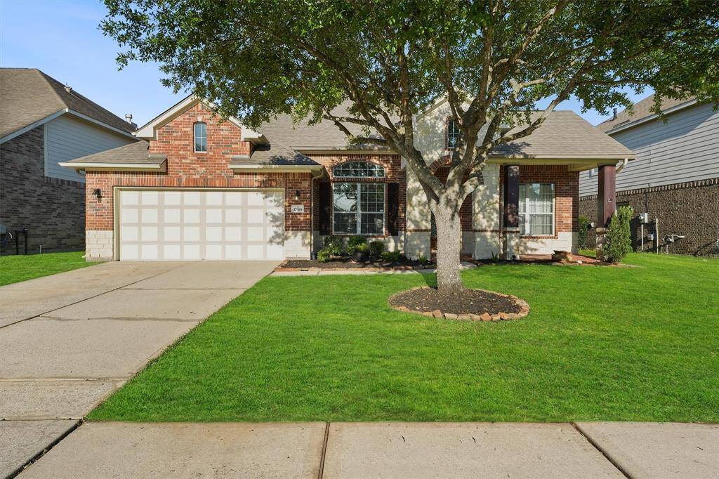 Shaded by the manicured oak tree awaits your move-in ready home at 17319 Lake Clark Lane.