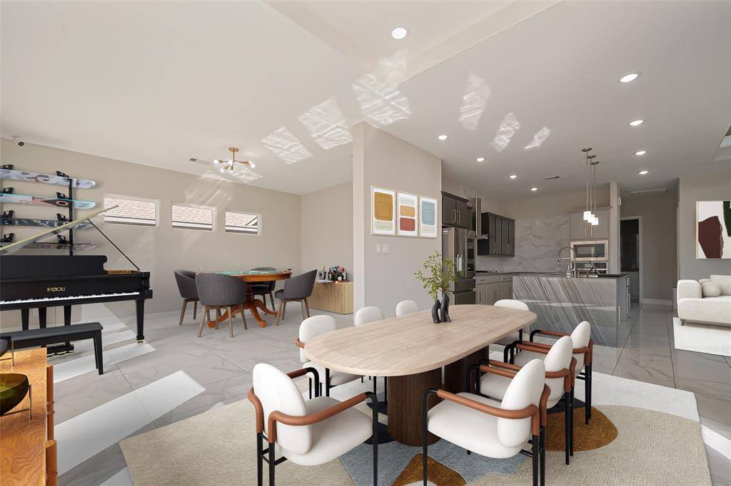 Bright breakfast area with tray ceilings. (virtually staged)