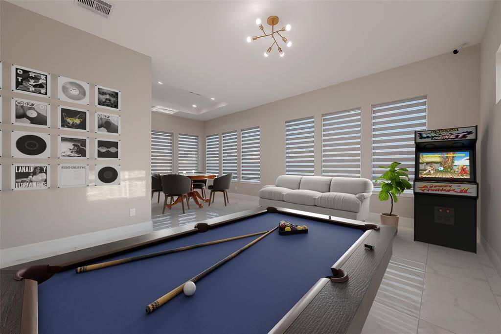 Game Room: Uniquely Located downstairs for easy access, ideal for fun-filled family evenings. Also, can be used as an additional sitting area or flex space! (virtually staged)