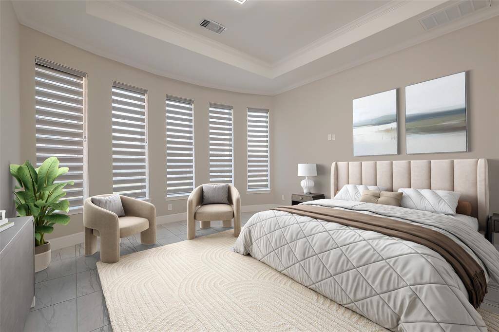 The primary suite is nothing short of spectacular, boasting an elegant curved wall of windows that floods the room with natural light. The tray ceiling adds architectural interest, while tile flooring enhances the space’s grandeur. (virtually staged)