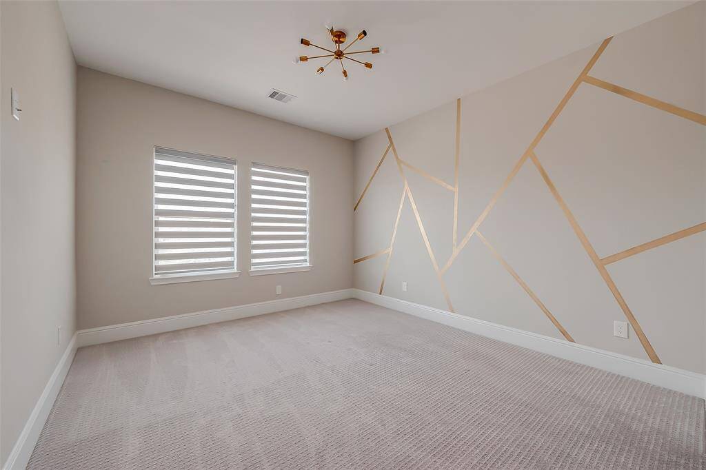 Upstairs, 2 spacious secondary bedrooms, each with its own walk-in closets! (1 of 2)