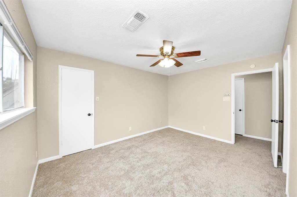 Bedroom #3, located on the 2nd floor, adjoins a full bath and has a walk in closet.