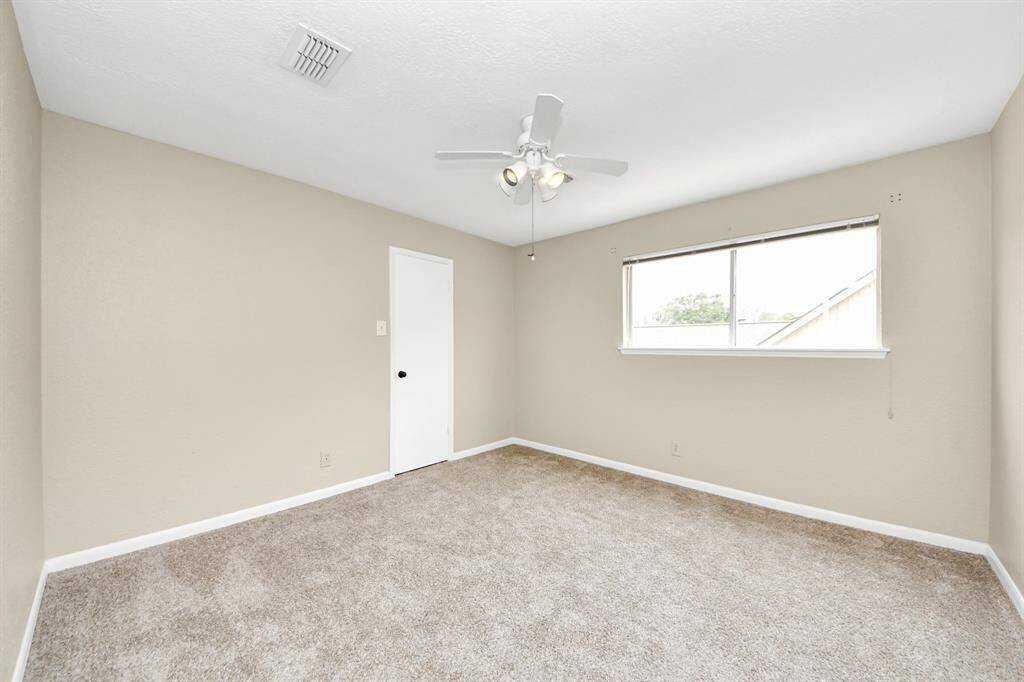 Bedroom #4, located on the 2nd floor, with a walk in closet.