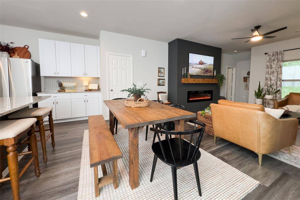 The kitchen area flows right into the dining and living room, making it perfect for entertaining guests.