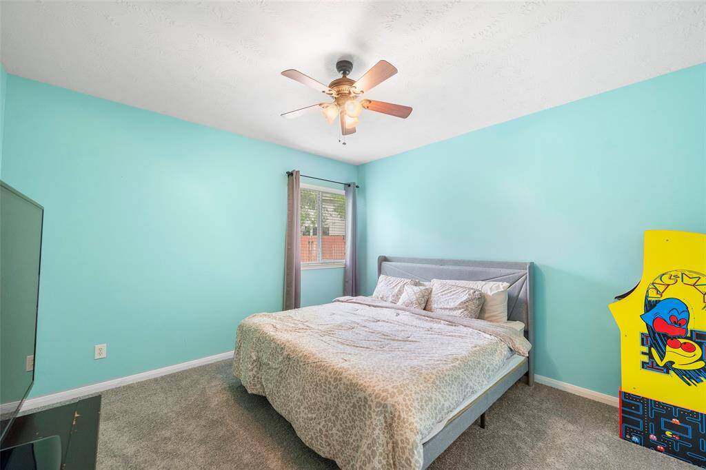 1st Floor spacious secondary room include soft carpeting, generous sized closets, and sunlit windows dressed with privacy blinds.