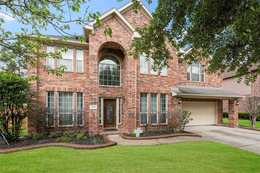 This beautifully maintained two-story brick home offers timeless curb appeal with a grand arched entryway, tall windows for natural light, and a spacious layout perfect for comfortable living!