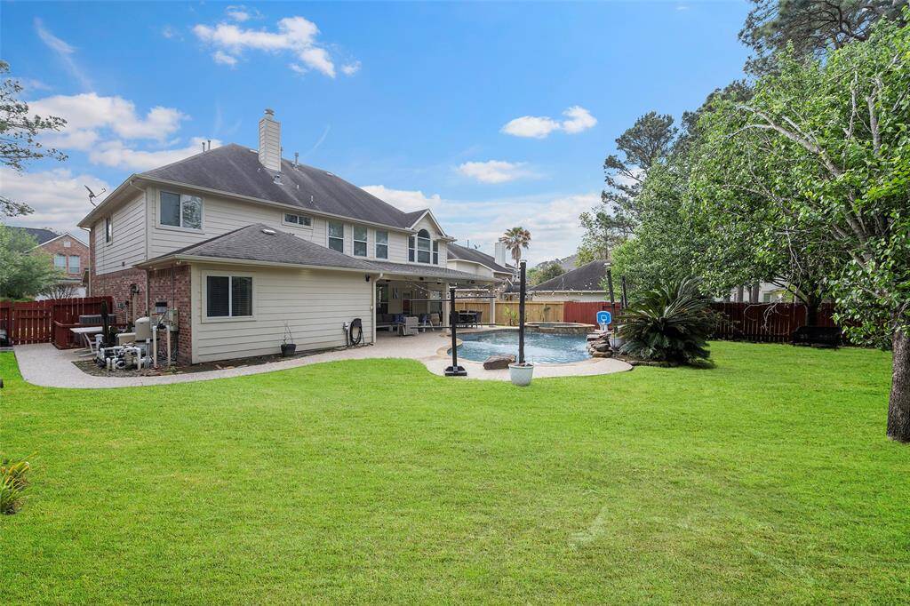 Spacious backyard retreat with plenty of room for children to play and enjoy the outdoors—perfect for family fun and weekend gatherings.