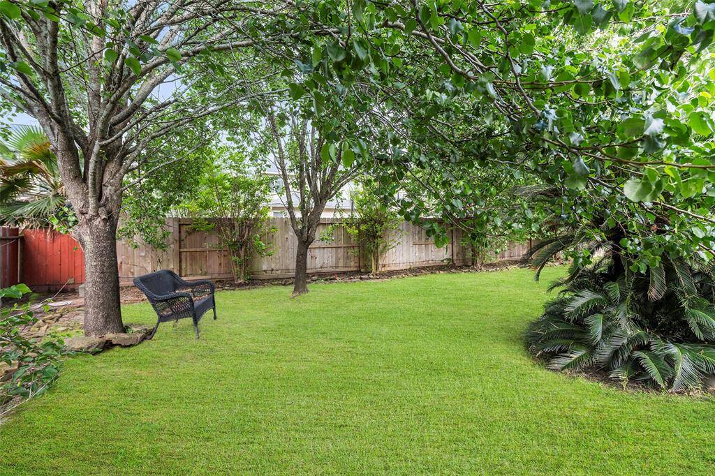 Spacious backyard retreat with plenty of room for children to play and enjoy the outdoors—perfect for family fun and weekend gatherings.