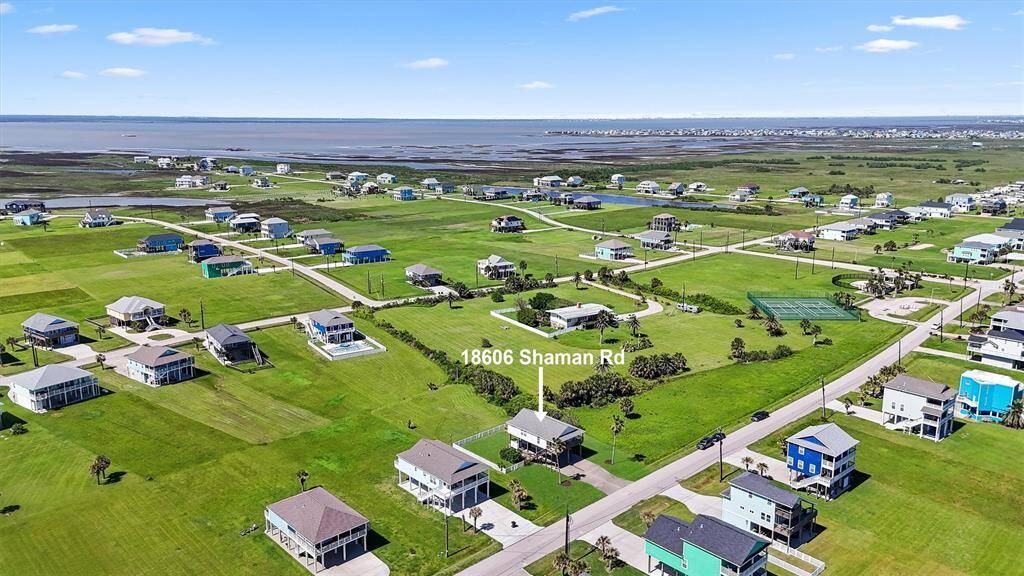 Positioned between the bay and beach, the home provides easy access to water activities and breathtaking coastal scenery.