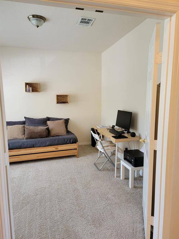 Study to left of front entrance door
