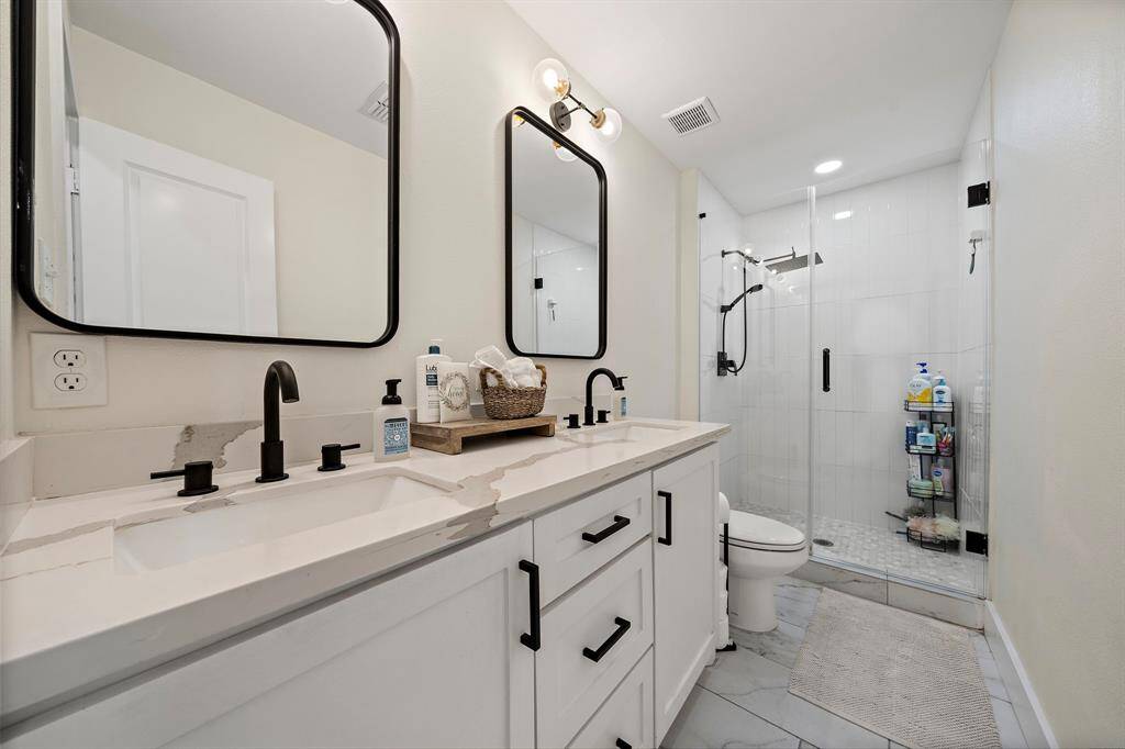 Secondary Bathroom with Double Sink and gorgeous stand up shower