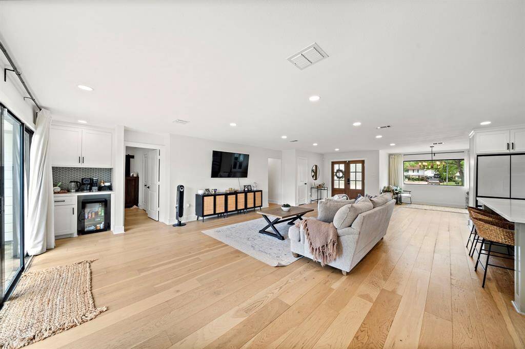 View of the spacious living room from the Mud Room