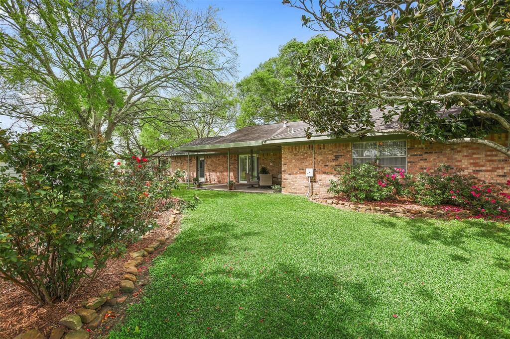 Experience tranquility in your lush, green backyard oasis.