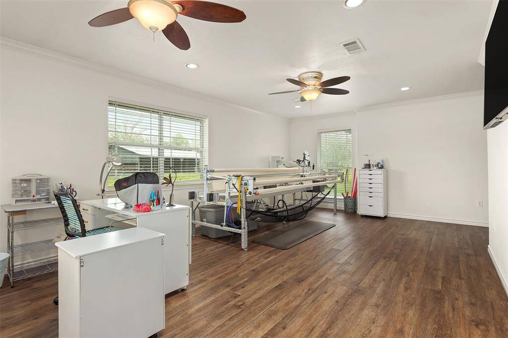 This spacious room offers ample space for a cozy sitting area.