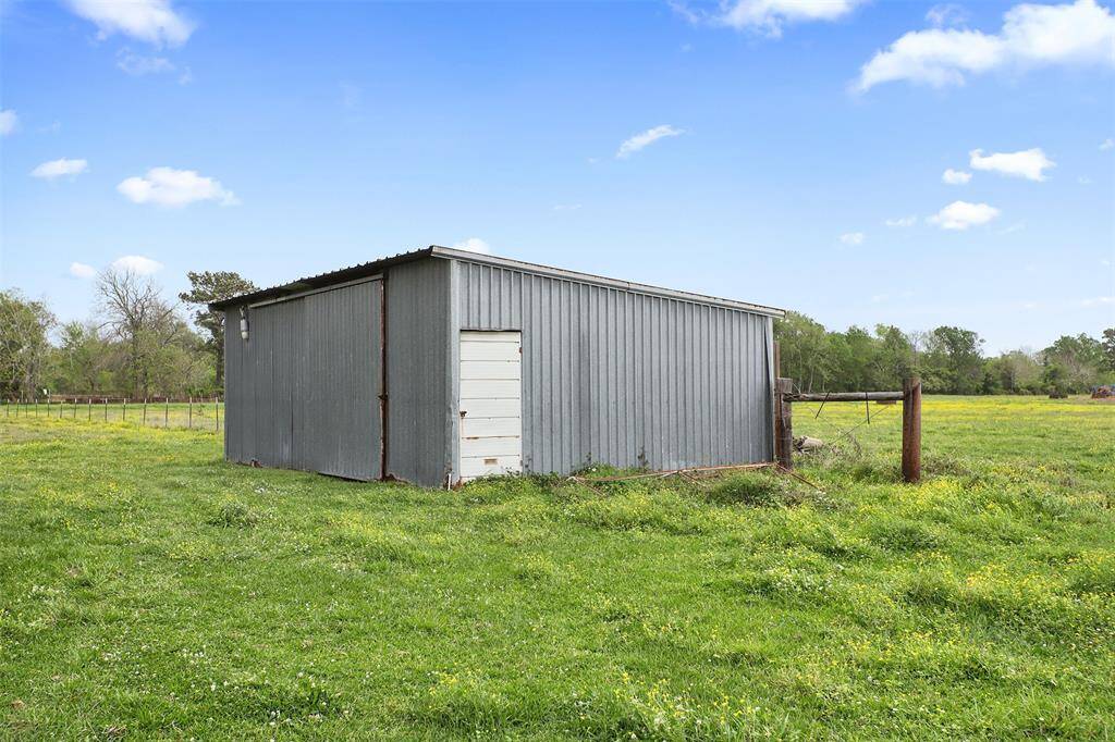 Spacious storage shed perfect for keeping supplies organized and secure.