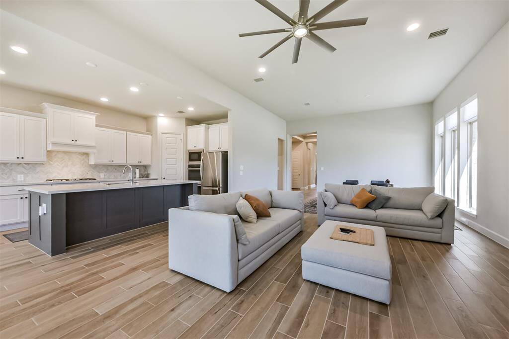 Kitchen opens to living room