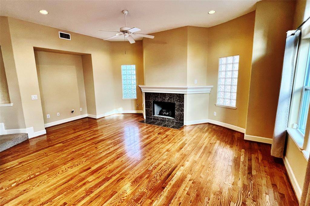 The gaslog fireplace is the focus of the livng area, with a separte TV nook to the side.