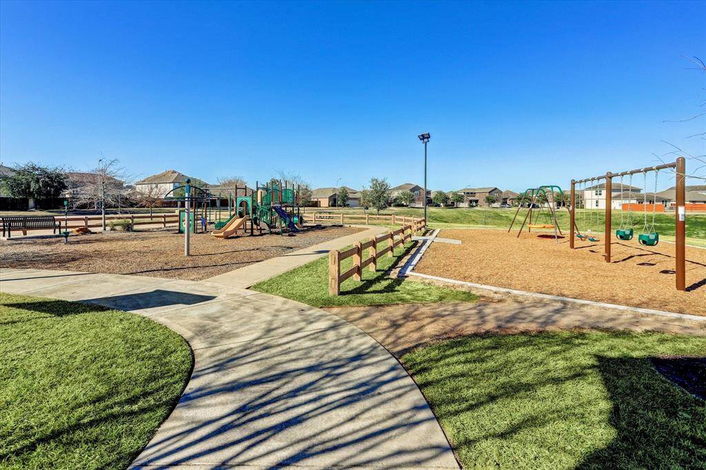 Just a short walk from your new home, the spacious playground sits beside the pool and scenic lake—offering fun and convenience for the whole family.