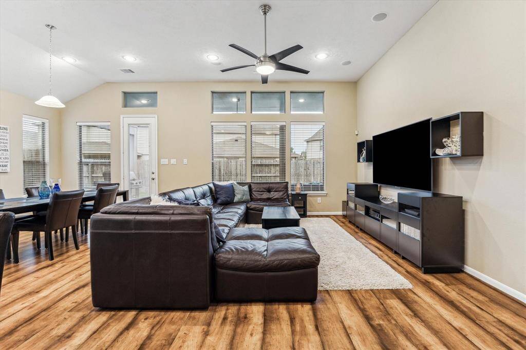 This spacious room easily accommodates a large furniture set—with plenty of room to spare.