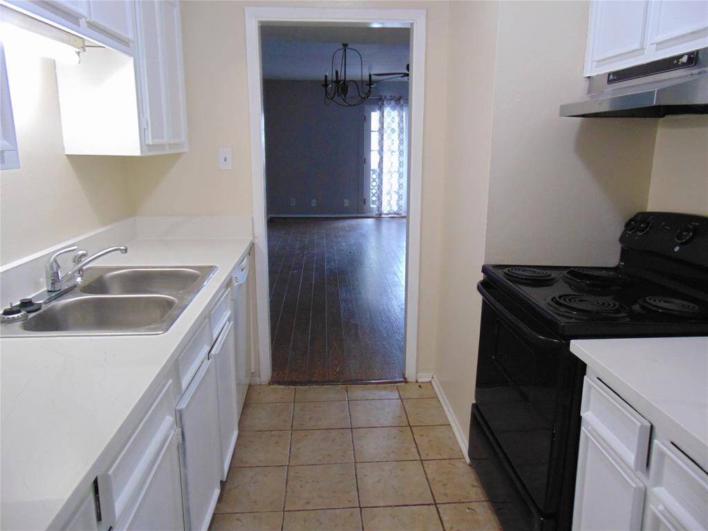 Newly renovated kitchen with quartz countertops